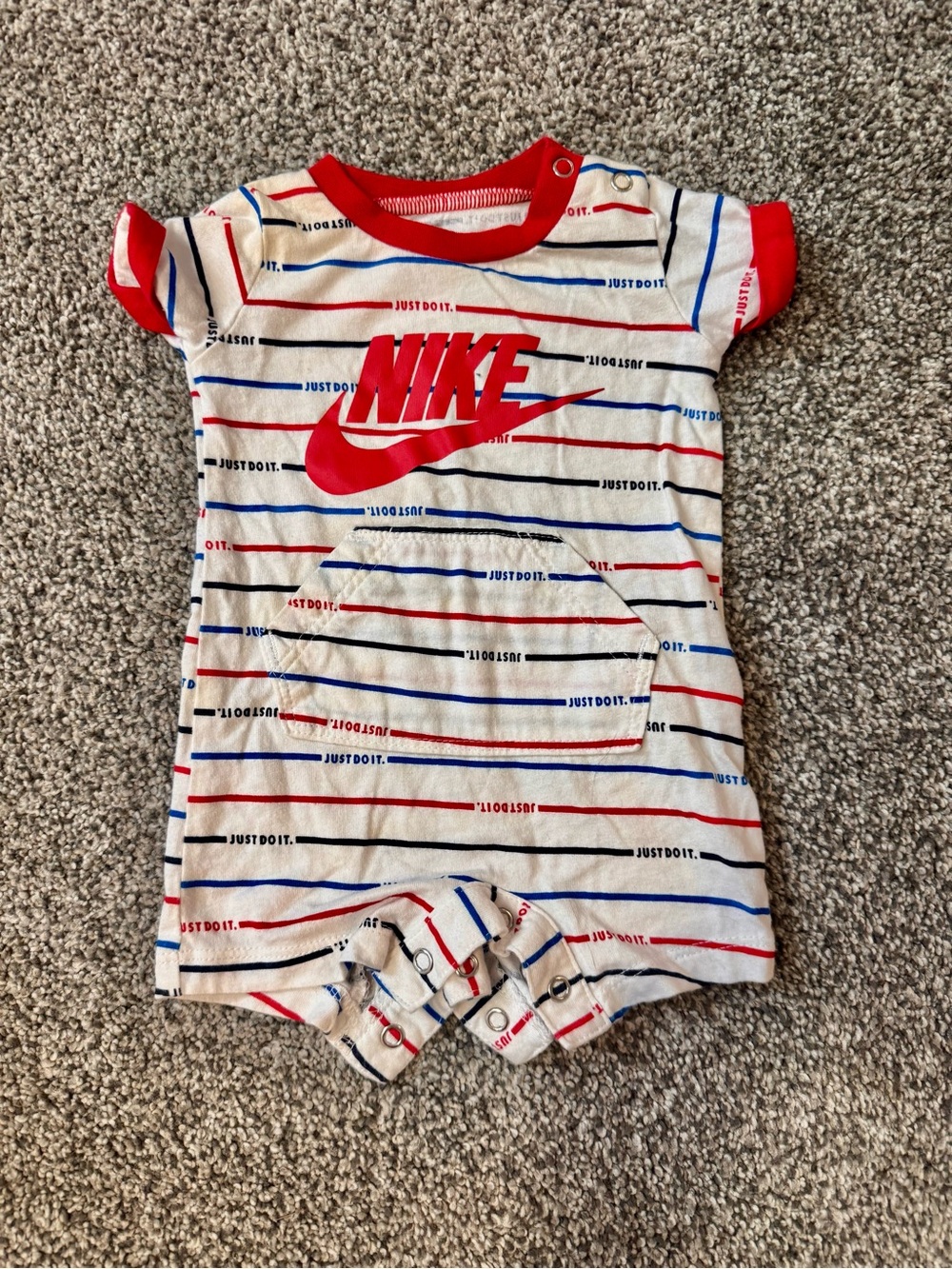 Nike White One-Piece with Red, Blue and Black Stripes